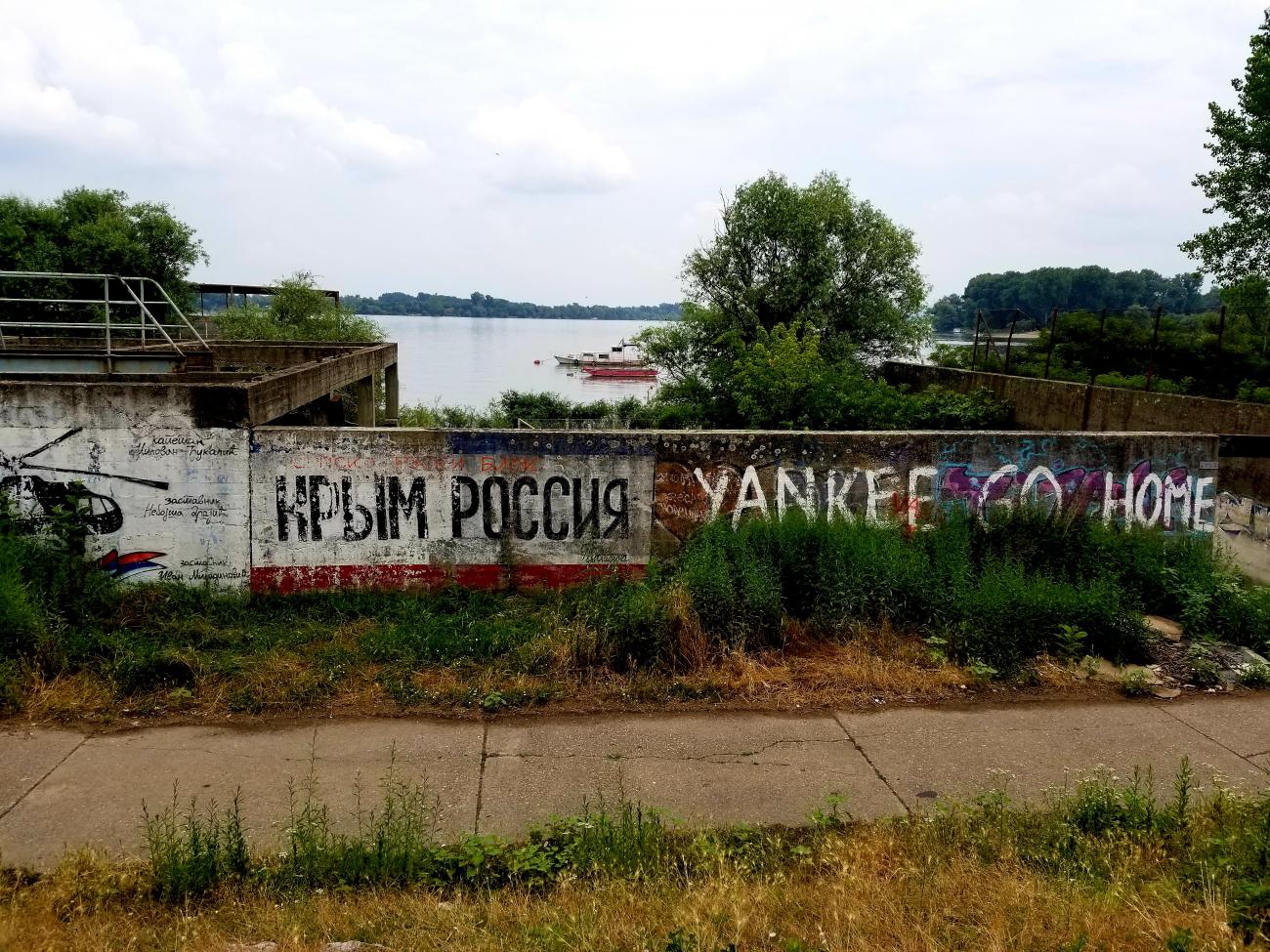 A graffiti wall a bit outside Belgrade, Serbia reads "Yankee Go Home"